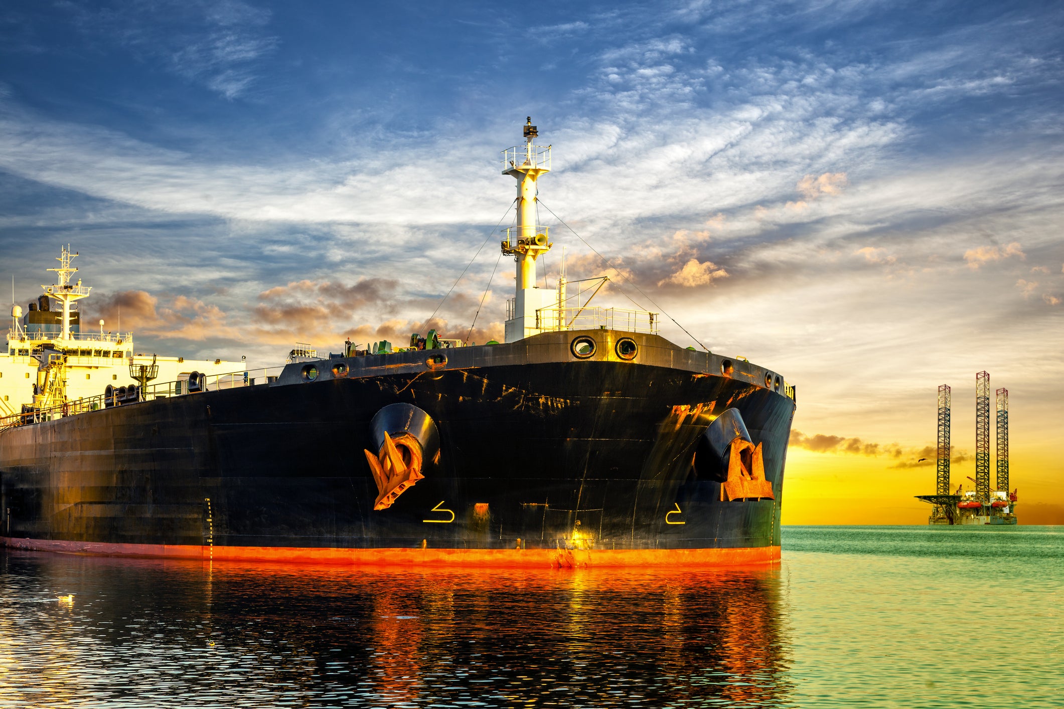 tanker-ship-and-oil-platform-on-offshore-area-at-sunset